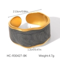 Detail of adjustable wide ring featuring grey marble enamel inlay and gold steel plating - Black Marble Texture Wavy Wide Ring (HC-R30427-BK)