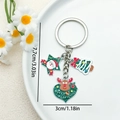Christmas keychain with Santa star, tree and reindeer charms on white ceramic plate - Christmas Star and Heart Reindeer (ER829)