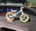 Miniature white and yellow balance bike model with Super Speed print for dashboard decor - Large/Yellow Base / Yellow Base Bike