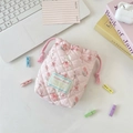 Close-up of pink quilted drawstring bag with cute bear patterns and floral details - Pink Flower Rabbit