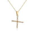 Macro shot of 18K gold plated cross pendant necklace with sparkling zircon stones - Letter X