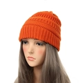 Bright orange cable knit beanie for women in a warm, minimalist ribbed winter style - Orange