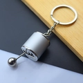 Detail of 6-speed manual gearbox gear shifter keychain in matte and polished silver finish - Gear Shift Knob / Silver