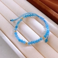 Blue beaded bracelet with gold accents and adjustable cord on a velvet display - 7# Gold Blue Beaded Bracelet