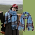 Blue and brown plaid tassel scarf with rainbow accents shown on a model and flat lay - Blue Brown Plaid