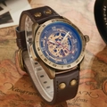Detail of bronze skeleton watch with tachymeter bezel and riveted leather strap - S016 Brown