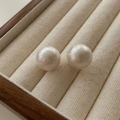 Macro shot of large creamy cotton pearls with textured finish in a beige jewelry box - 76# Silver Needle-White-Medium