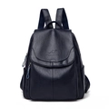 Women's minimalist navy blue backpack with textured soft leather and kangaroo logo - Blue