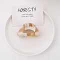 Elegant semi-round acetate hair claw clip with milk tea marble pattern on white plate - Milk Coffee White