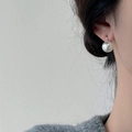 Elegant white freshwater pearl earrings 12-14mm with S925 silver studs on female model - Simple Large White Pearl Stud