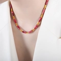 Perlenkette aus kaiserlichem Stein mit dunkelroten Zylindern und goldenen Akzenten - 39+5cm / Rot