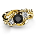 Elegant gold ring featuring a large black zircon with ornate hollow curve detailing - US 7 / Gold