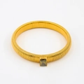 Macro detail of gold snake bracelet featuring a central emerald-cut green zircon stone - 10mmx18cm / Army Green Zirconia