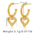 Detail shot of heart hoop earrings in 18K gold plating with cubic zirconia measuring 3cm - Segmented Hoop with Pave Hollow Heart