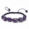 Detailed view of handmade purple amethyst bead with black woven cord and lava stone bead - Amethyst Bracelet