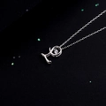 Elegant 925 sterling silver necklace featuring a dancing zircon letter L pendant - Style L Alphabet (NS869)