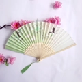 Green gradient bamboo folding fan with cherry blossoms, rabbit motif and green tassel - Green Gradient Rabbit Pagoda Cherry Blossom Style (Ladies' Fan-18)