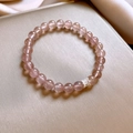 Detail of beaded crystal bracelet featuring a silver crown charm on a satin surface - Strawberry Crystal - Slim Waist Style (6mm)
