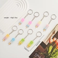 Detail view of 8 colorful ice cream keychains with size 10cm and weight 43g specs - Multicolor Ice Cream Set