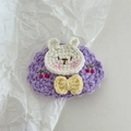 Handmade crochet bunny hair clip with purple floral base and yellow bow accessory - Crochet-Purple Rabbit