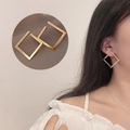 Square gold geometric stud earrings with sparkling zircon inlay shown on model - Gold Square