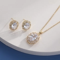Detail view of gold-plated necklace and stud earrings set with oval zircon stones - Gold Oval White Zirconia (HQ0001(3))