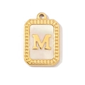 Close-up of golden letter M pendant featuring a polished shell inlay on white background - Letter M