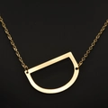 Elegant gold-plated necklace featuring a polished minimalist letter D pendant on a thin chain - Gold D