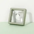 Silver thin ring with zirconia in a light green floating suspension jewelry display box - Fruit Green