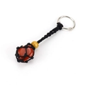 Detail of red heart stone in black woven net with yellow bead on silver keychain - Black Rope + Red Agate
