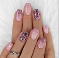 Detail of pink gradient and purple glitter press-on nails on soft white faux fur background - Pink Purple Gradient Glitter Style (CW448) with Yellow Jelly Glue