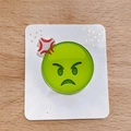 Angry green emoji acrylic pin accessory mounted on a white glittery display card - Angry Face / Brooch Style