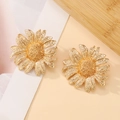 Vintage gold sunflower dangle earrings with detailed metal petal texture on beige surface - Gold Daisy Stud Earrings (9355)
