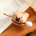 Cartoon brown bear head bicycle bell with lever on a rustic wooden surface - Capybara Wooden Fish Ornament - Cool
