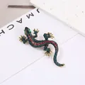 Vintage lizard brooch with blue and magenta rhinestones on antique gold alloy base - Malachite green