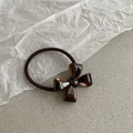 Brown acrylic bow hair tie with glossy finish on a dark elastic band for ponytails - Dark Coffee