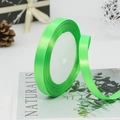 Bright green satin ribbon 15mm roll for elegant gift wrapping and floral bouquets - Fruit Green