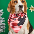 Close-up of red and white striped Christmas pet bandana with black reindeer silhouette - Red and White Striped Reindeer Style