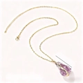 Natural amethyst raw stone necklace with gold-plated chain on a clean white background - Amethyst