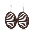 Detail of dark brown hollow oval wooden earrings with metallic silver ear hooks - Style 36