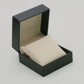 Black faux leather watch box with lychee texture and soft beige cushion padding - Black Exterior Beige Interior