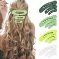 Matte plastic hair clips in four colors and three sizes shown on model and white background - Set 3