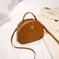 Brown quilted semi-circle crossbody bag with golden clover logo and dual zipper - Brown