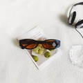 Retro cat eye sunglasses with classic black frame and amber orange tinted lenses - Black Orange