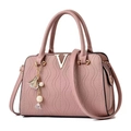 Elegant mauve embossed leather tote bag with gold V-logo and floral charm accessory - Pink