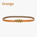 Slim orange leather belt for women featuring a stylish gold M-shaped metal buckle - Orange
