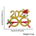 Golden 2023 New Year party glasses with Christmas hat and snowflake detail, 15cm wide - Christmas Hat Gold 2026 Glasses