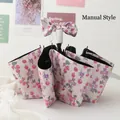 Manual folding umbrella featuring cream floral print with black UV sun protection coating - 3-Fold Manual Style - Pink Purple Floral