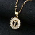 Close-up of letter T pendant with baguette-cut zircon and 18K gold plated chain - Letter T (Without Chain) Gold