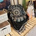 Close-up of woven bohemian blanket with zodiac patterns and decorative tassel fringe - XT905-2 Twelve Zodiac Tarot